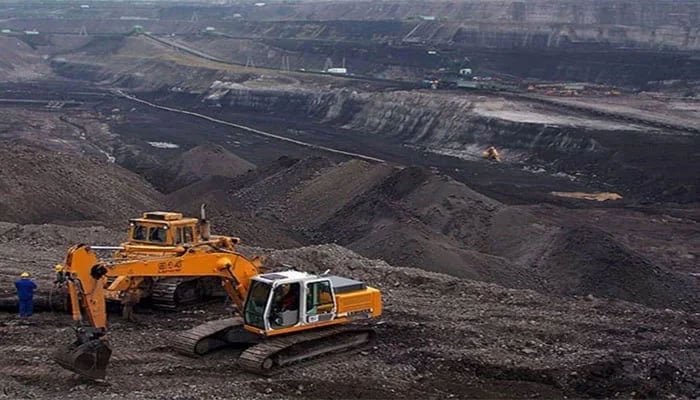 The representational image shows workers busy on a coal mining project. — APP/File