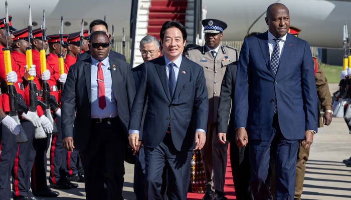 Taiwan President Lai Ching-te walks with Eswatini Prime Minister Russell Mmiso Dlamini upon arriving in Eswatini, May 2, 2026. — Reuters