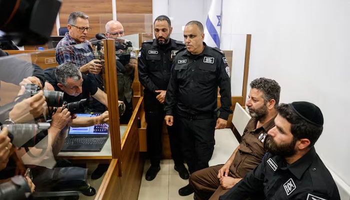 Activist Saif Abu Keshek, a member of the Global Sumud Flotilla detained by Israel, sits at a magistrates court for a detention extension hearing in Ashkelon, southern Israel, May 3, 2026. —Reuters