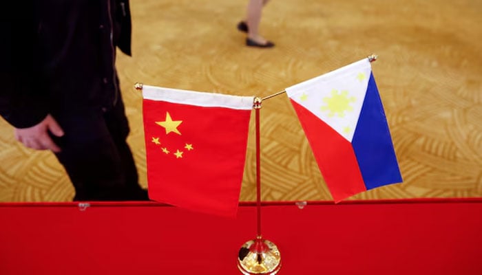 National flags of China and the Philippines are seen in Beijing, China, January 23, 2017. — Reuters