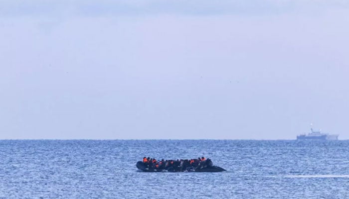 This undated photo shows an overcrowded boat transporting people across the sea. — Reuters