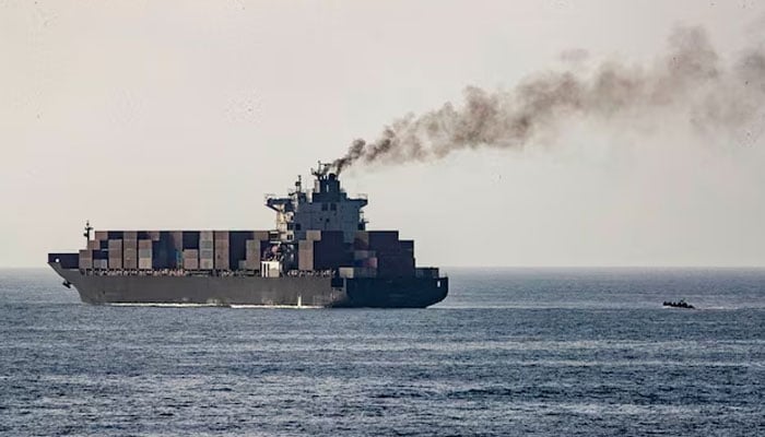 US forces patrol near the Iranian-flagged cargo ship M/V Touska after it was boarded and seized by US forces on Sunday, at a location given as the Arabian Sea, in this handout image released April 20, 2026.—Reuters
