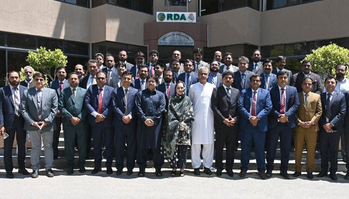 The image shows a group photo of the participants of the 8th Six-Week Post-Induction Training Course at the Rawalpindi Development Authority (RDA) Complex  on May 5, 2026. — Facebook@RawalpindiDevelopmentAuthority