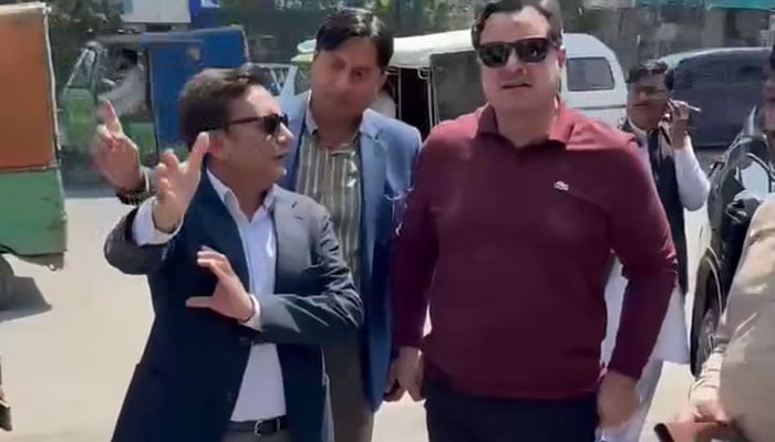 Minister for Housing and Urban Development Bilal Yasin (right) visits Ichhra Bazaar on May 5, 2026. — Facebook@bilal.yaseen.425988/Screengrab