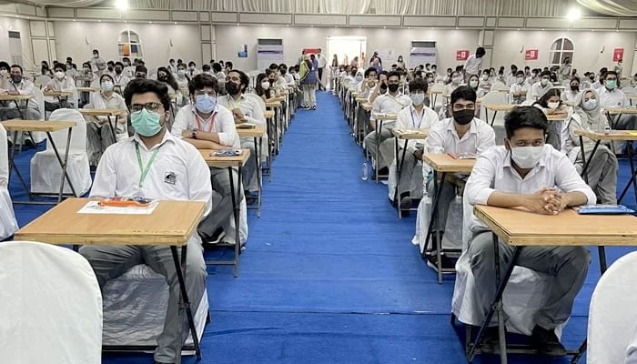 Students can be seen in an examination hall in Karachi on April 26, 2021, as Cambridge exams are underway in Pakistan. — X@Deputy Commissioner South Karachi