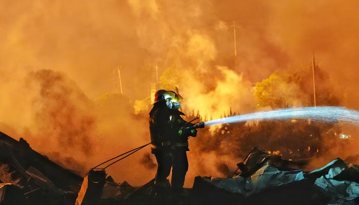 Firefighters work to extinguish a fire following a blast at a fireworks manufacturing factory in Liuyang, Hunan province, China, May 5, 2026.—Reuters