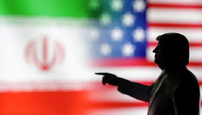 A 3D-printed miniature model depicting US President Donald Trump, Iranian and US flags in this illustration taken on April 17, 2025. — Reuters
