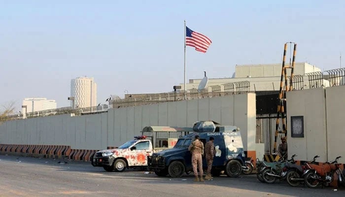 Police and Paramilitary vehicles stand outside the US Consulate General in Karachi on March 2, 2026. — Reuters