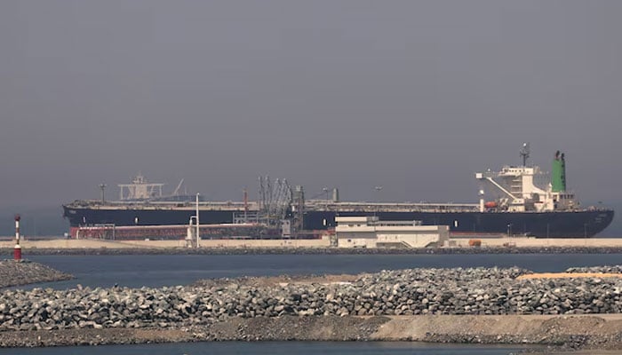 A cargo ship docked at the Port of Fujairah, as the US-Israel conflict with Iran limits marine traffic in the Strait of Hormuz, in Fujairah, United Arab Emirates, May 6, 2026.—Reuters