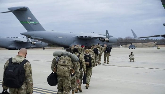Representational image of US military personnel boarding a C-17 transport plane for deployment. — Reuters/File