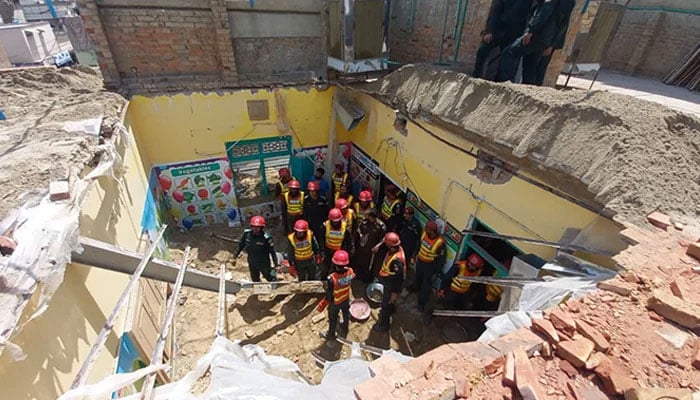 Emergency teams respond to a school roof collapse incident in Dera Ghazi Khan during rescue operations on May 7, 2026. — Rescue 1122 DG Khan