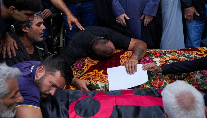 Mourners attend the funeral of four people killed in an Israeli strike, in Ansariyeh, Lebanon, 8 May 2026 — Reuters