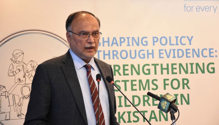 Federal Minister for Planning, Development, and Special Initiatives Ahsan Iqbal delivers a keynote address at the conference hosted by PIDE in collaboration with UNICEF Pakistan on December 17, 2025. — Facebook@PIDEIslamabad