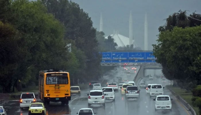 Vehicles drive during rain in Islamabad, April 7, 2026. — Online