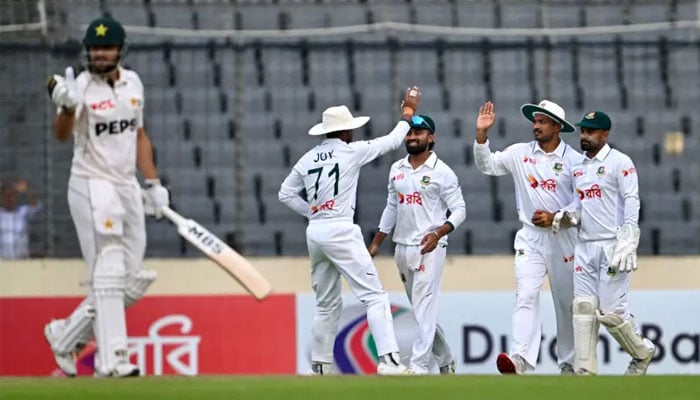 Bangladeshs players celebrate after the dismissal of Pakistans Salman Agha during the third day of the first Test cricket match between Bangladesh and Pakistan at the Sher-e-Bangla National Stadium in Mirpur on May 10, 2026. — AFP