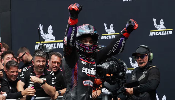 Aprilia Racings Jorge Martin celebrates with the team after winning the MotoGP race. —Reuters