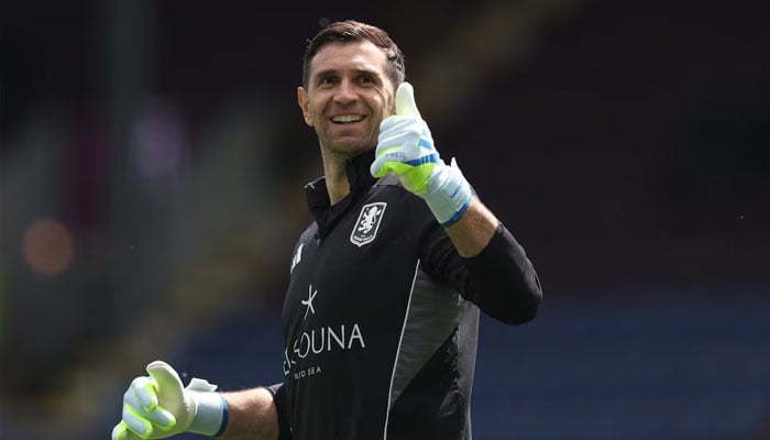 Aston Villas Emiliano Martinez reacts during the warm up before the match. —Reuters