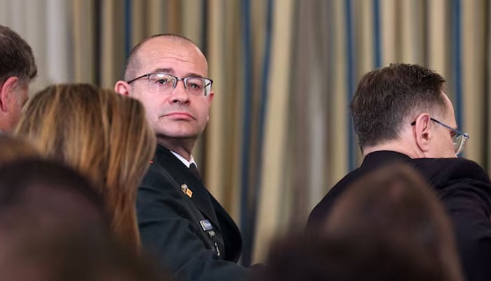 Israels Military Secretary to the Prime Minister Roman Gofman waits before a joint press conference of US President Donald Trump and Israeli Prime Minister Benjamin Netanyahu in the State Dining Room at the White House, in Washington, DC, US, September 29, 2025.—Reuters
