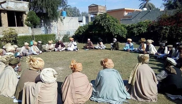 Tribal elders take part in a jirga session in Khyber Pakhtunkhwa. — Facebook@Tank Jirga/File