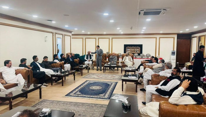 PTI Chairman Barrister Gohar Ali Khan addressing the parliamentary party meeting of the opposition parties in the National Assembly on Monday. —Facebook@barristergoharkhan