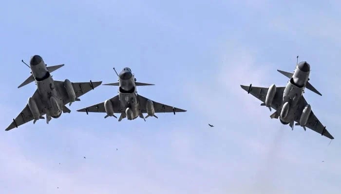 Pakistan Air Force J-10 fighter jets fly past during the national day parade in Islamabad on March 23, 2025. —AFP