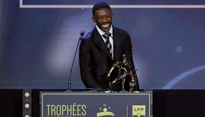 Paris Saint-Germains French forward Ousmane Dembele receives the Ligue 1 best player award during the 34th UNFPs (Frances professional players union) French football awards ceremony in Paris on May 11, 2026. —AFP