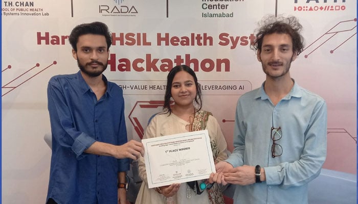 Participants hold a certificate for a photo at NIC Islamabad on May 7, 2026. — Facebook@NICPakistan