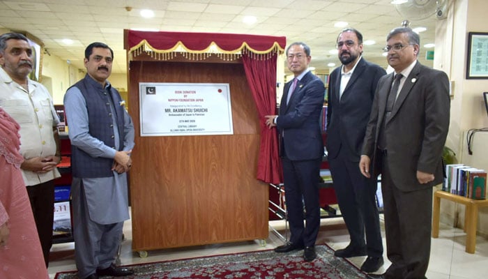 Ambassador of Japan Akamatsu Shuichi presents the diverse collection spanning Japans history, politics, economy, security, international relations, philosophy, literature, language, culture and more to Prof. Dr Nasir Mahmood, AIOU Vice-Chancellor during a handover ceremony on May 12, 2026. — APP