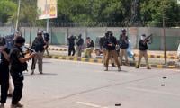 Police Use Tear Gas To Disperse Protesters