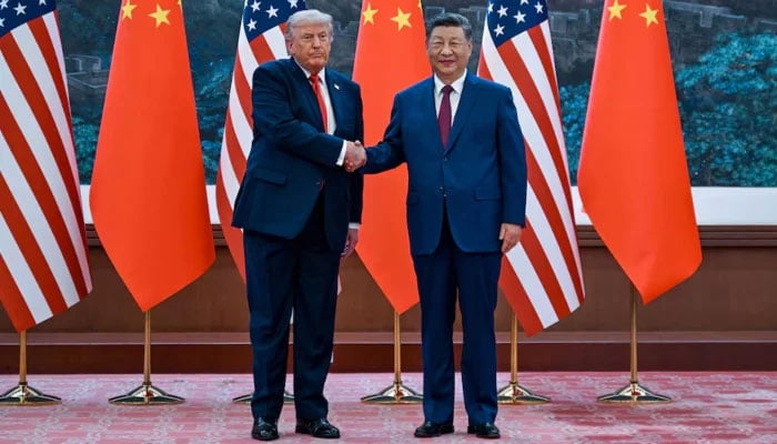 The scene as US President Donald Trump participates in events at the Great Hall of the People and does a greeting with the President of the People’s Republic of China, Xi Jinping, May 14, 2026. — Reuters