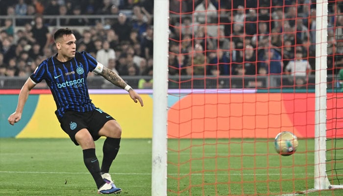 Lautaro Martinez scores Inter Milans second goal in the Italian Cup final, won 2-0 against Lazio. —AFP