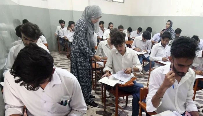 Students solve examination papers during annual examination at an examination centre in Karachi, April 29, 2026. — Online