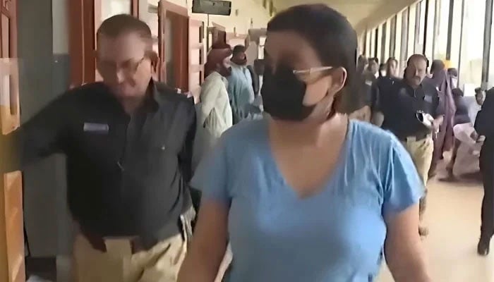 Police produce alleged drug peddler Anmol alias Pinky before a local court in Karachi on May 12, 2026. — YouTube/Geo News/screengrab