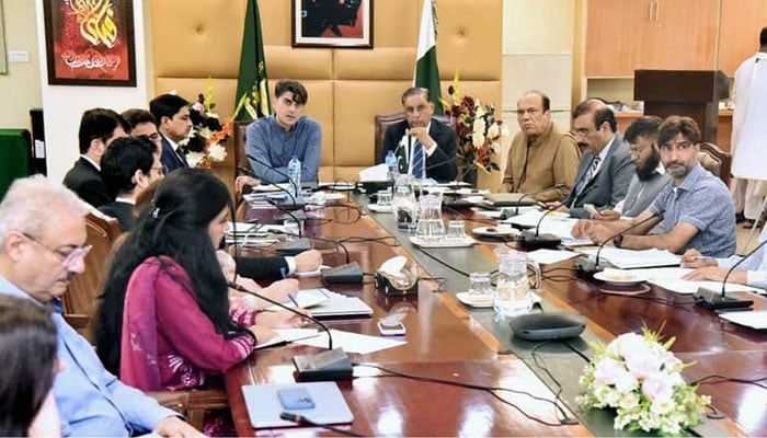 HIV prevention meeting chaired by Minister of State for National Health Services, Dr Mukhtar Bharath, chair of the Task Force, along with Co-Chair Major General (R) Dr Azhar Mahmood Kiani, reviewing key strategies to curb the spread of HIV in Pakistan on May 14, 2026. — APP