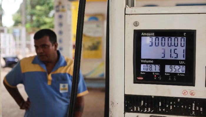 Newly increased fuel prices are displayed at a petrol pump in Malvan, India, May 15, 2026. — Reuters