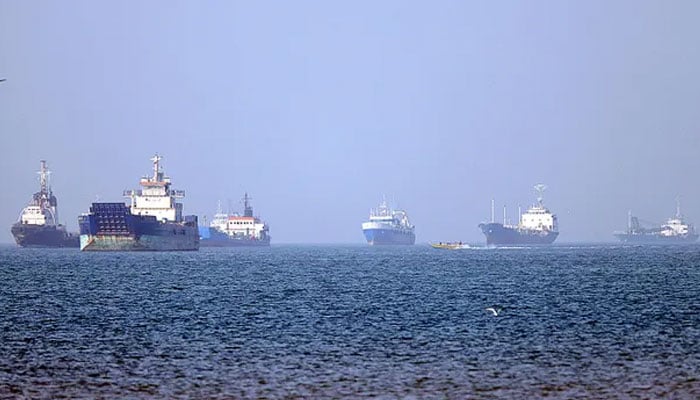 Ships are anchored in the Strait of Hormuz off Bandar Abbas in southern Iran on May 4, 2026. — Reuters