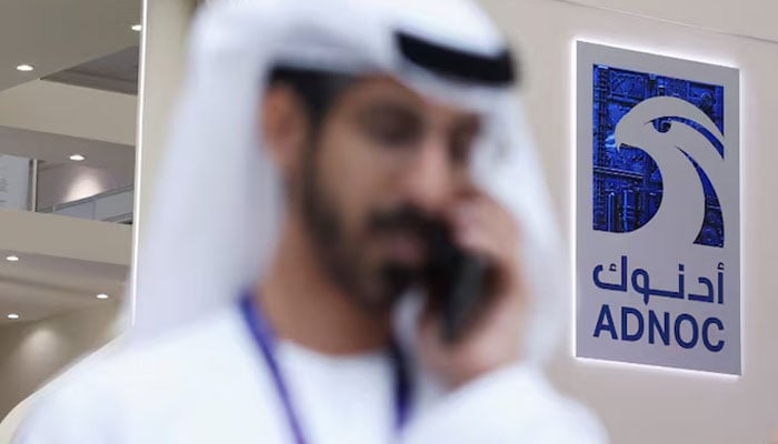 A logo of ADNOC is displayed at the Make it in the Emirates (MIITE) conference, in Abu Dhabi, United Arab Emirates, May 4, 2026. — Reuters