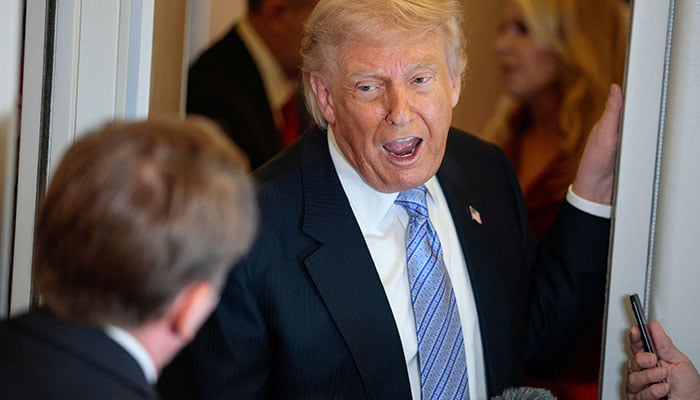 US President Donald Trump speaks to the press aboard Air Force One enroute to the US following his official visit with President Xi Jinping in China, May 15, 2026. — Reuters