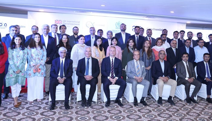 The image shows the group photo after the two-day workshop. — Karandaaz Pakistan/File