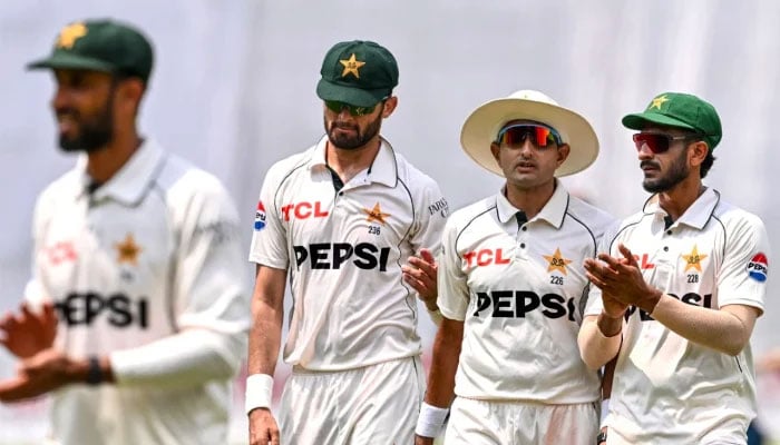 Pakistans Mohammad Abbas (second from right) along with teammates Shaheen Shah Afridi (centre) and Hasan Ali leaves the field at the end of first inning during the second day of the first Test match against Bangladesh at the Sher-e-Bangla National Stadium in Mirpur on May 9, 2026. - AFP