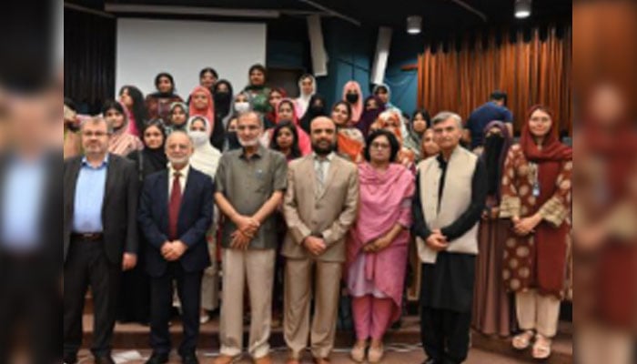 Participants pose for a photo during the inaugural lecture organised by the Institute of Policy Studies in collaboration with the International Islamic University Islamabad on May 14, 2026. — Facebook@InstituteOfPolicyStudiesPakistan