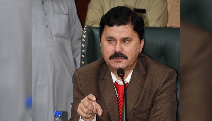 Hazara University Vice-Chancellor Dr Ikramullah Khan speaks in a meeting. — Facebook@hazarauniversitypakistan/File