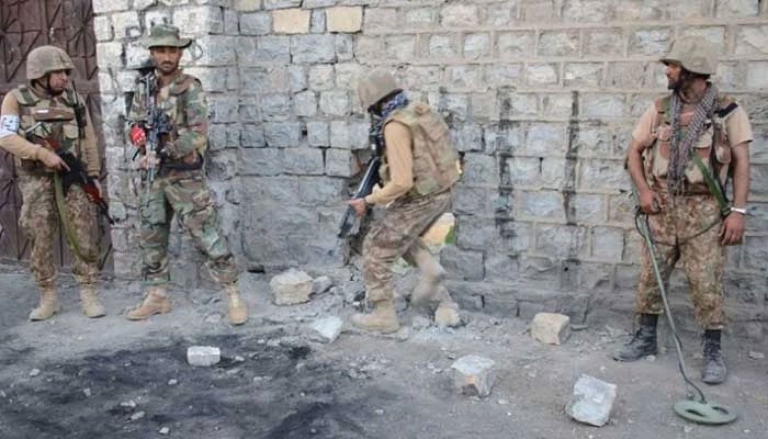 Security forces are seen taking position during an operation in this undated image. — ISPR/File