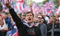 Tens Of Thousands Turn Out For UK Far-right Rally, Counter Demo