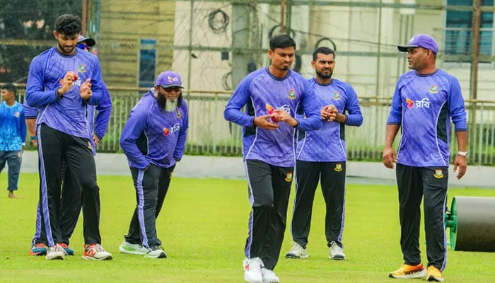 Bangladesh spinner Taijul Islam (centre) prepares to bowl during a nets session at the Sylhet International Cricket Stadium on Friday.— Bangladesh Cricket Board