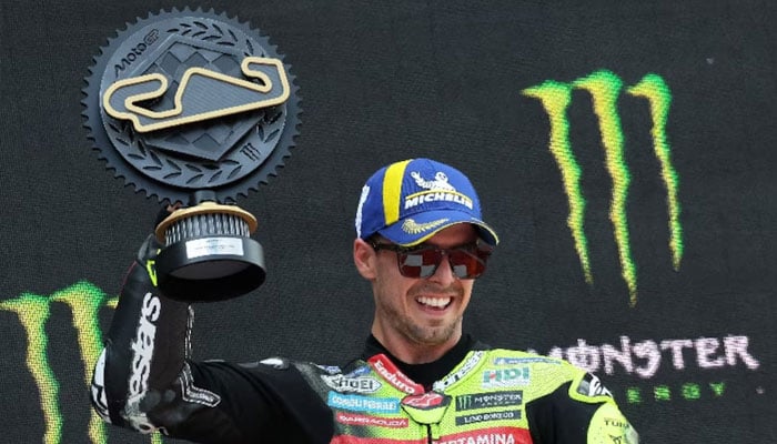 VR46 Racing Teams Fabio Di Giannantonio celebrates on the podium after winning the MotoGP race. —Reuters