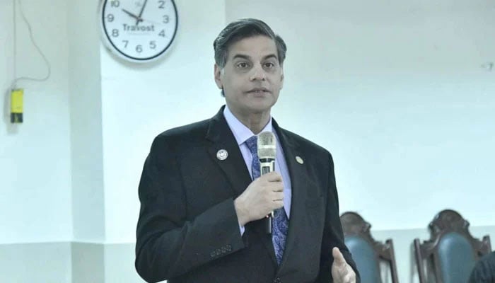 Ameeruddin Medical College Principal Prof Dr Farooq Afzal addresses an event on February 27, 2026. — Facebook@amcpgmi