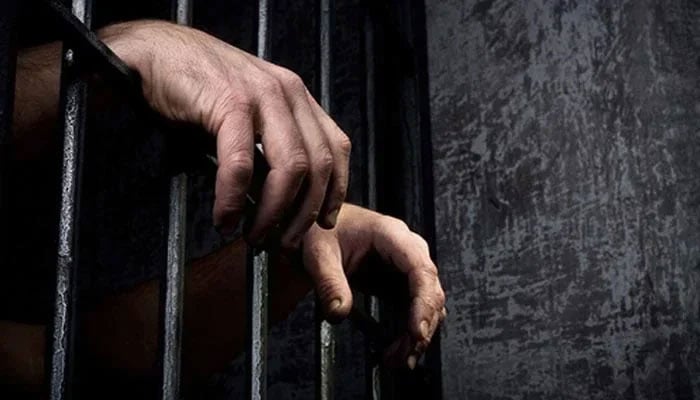 A representational image of an arrested person. — AFP/File