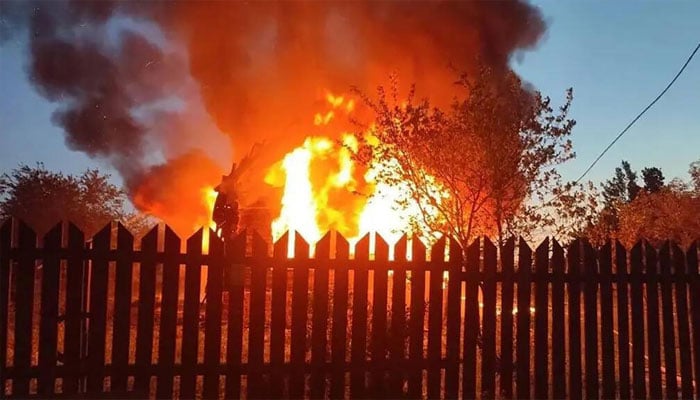 Moscow Region Governor Andrey Vorobyov posted a photo of a burning building following the barrage. —AFP