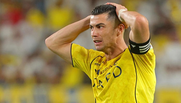 Cristiano Ronaldo reacting during the match. —AFP/File